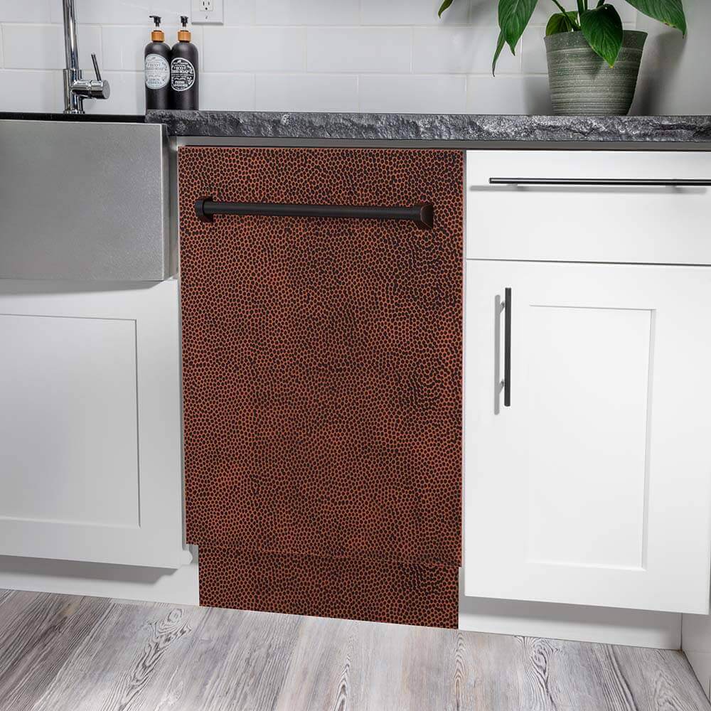 ZLINE 18 in. Tallac Series 3rd Rack Top Control Built-In Dishwasher in Hand Hammered Copper with Stainless Steel Tub, 51dBa (DWV-HH-18) built-in to white cabinets with granite countertops in a luxury kitchen.