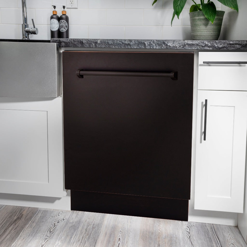 ZLINE 24 in. Tallac Series 3rd Rack Tall Tub Dishwasher in Oil Rubbed Bronze with Stainless Steel Tub, 51dBa (DWV-ORB-24) built-in to white cabinets with granite countertops in a luxury kitchen.