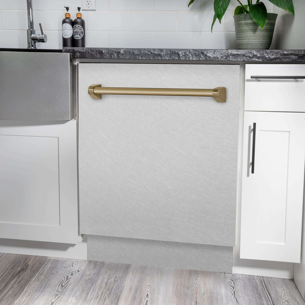 ZLINE Autograph Edition 24 in. Tallac Series 3rd Rack Top Control Built-In Tall Tub Dishwasher in Fingerprint Resistant Stainless Steel with Champagne Bronze Handle, 51dBa (DWVZ-SN-24-CB) built-in to white cabinets with granite countertops in a luxury kitchen.