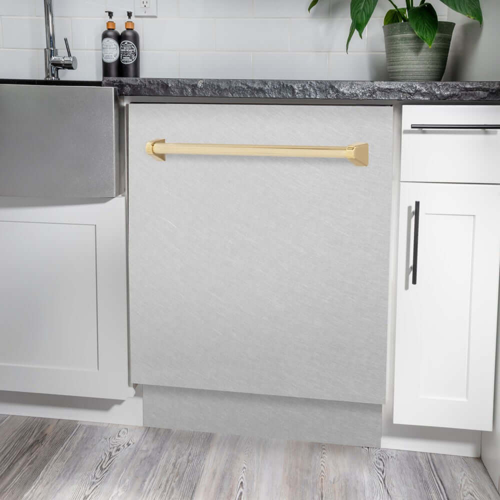 ZLINE Autograph Edition 24" Tall Tub Dishwasher in DuraSnow with Polished Gold Accent Handle (DWVZ-SN-24-G) in a luxury kitchen.