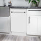 ZLINE 18 in. Tallac Series 3rd Rack Top Control Built-In Dishwasher in White Matte with Stainless Steel Tub, 51dBa (DWV-WM-18) built-in to white cabinets with granite countertops in a luxury kitchen.