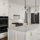 ZLINE Autograph Edition 36 in. 21.6 cu. ft. Counter-Depth French Door Refrigerator with Water and Ice Dispenser in Fingerprint-Resistant Black Stainless Steel with Polished Gold Traditional Handles (RFMZ-W-36-BS-G) in a kitchen with white cabinets, black appliances, and gold fixtures.
