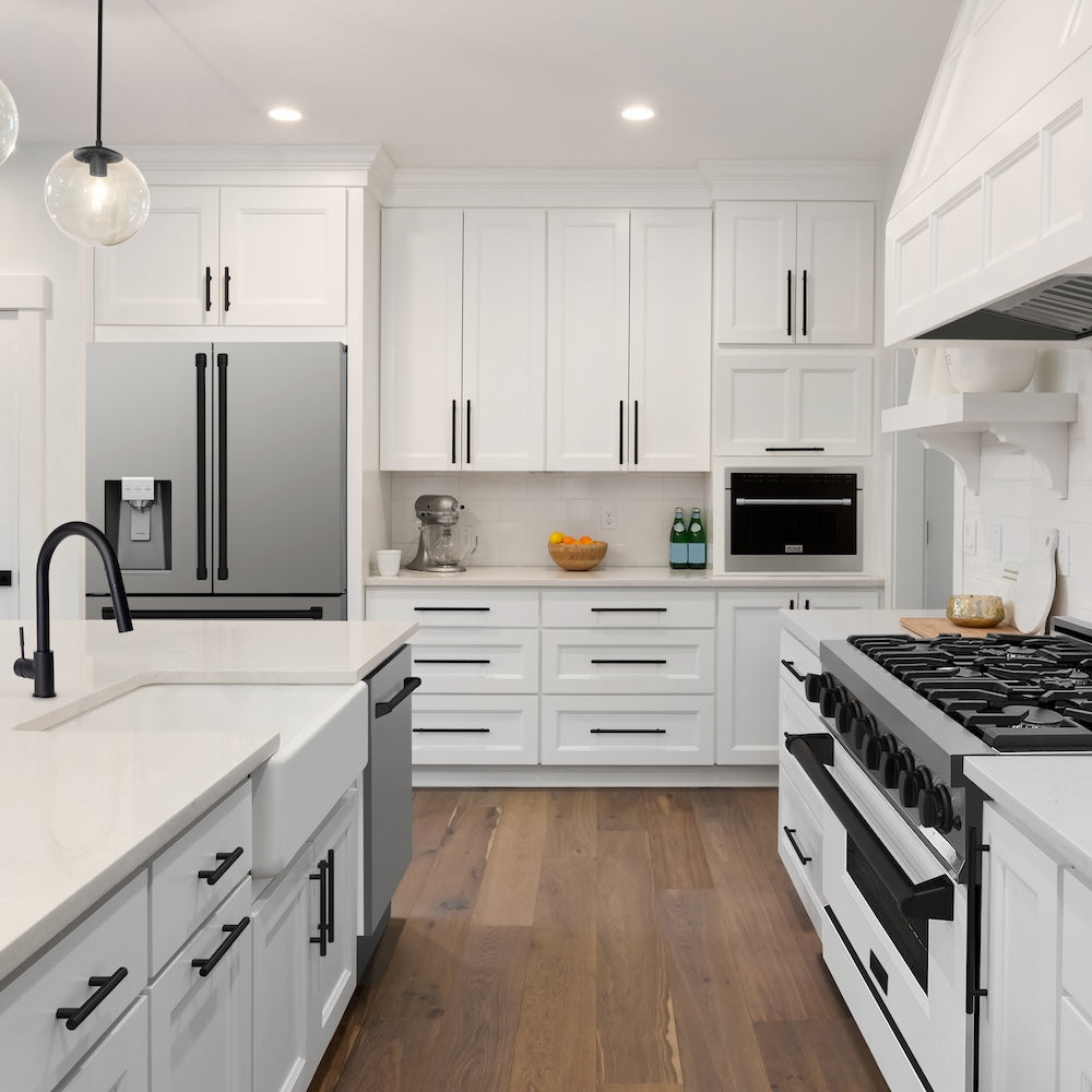 ZLINE Autograph Edition 36 in. 21.6 cu. ft 4-Door French Door Refrigerator with Water and Ice Dispenser in Fingerprint Resistant Stainless Steel with Matte Black Traditional Handles (RFMZ-W-36-MB) in a luxury kitchen.