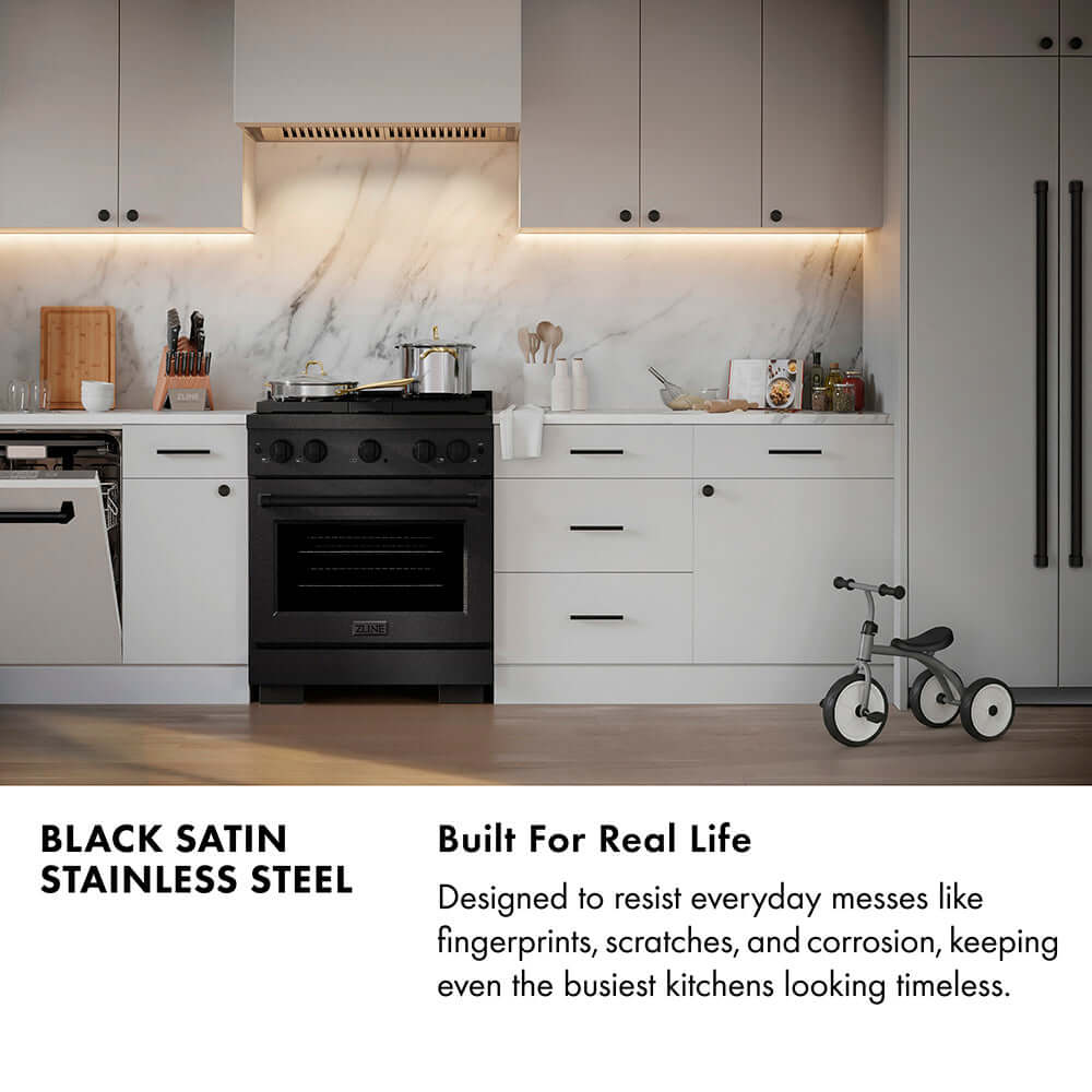 Black Satin Stainless Steel infographic. Image: Modern kitchen with black satin stainless steel appliances and white cabinets. Text: Built for Real Life. Designed to resist everyday messes like fingerprints, scratches, and corrosion, keeping even the busiest kitchens looking timeless.
