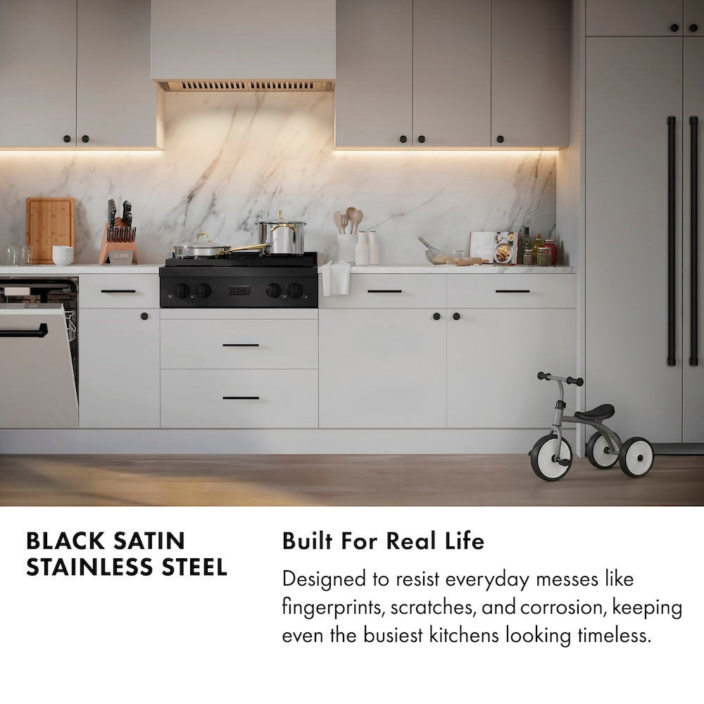 Black Satin Stainless Steel infographic. Image: Modern kitchen with black satin stainless steel appliances and white cabinets. Text: Built for Real Life. Designed to resist everyday messes like fingerprints, scratches, and corrosion, keeping even the busiest kitchens looking timeless.