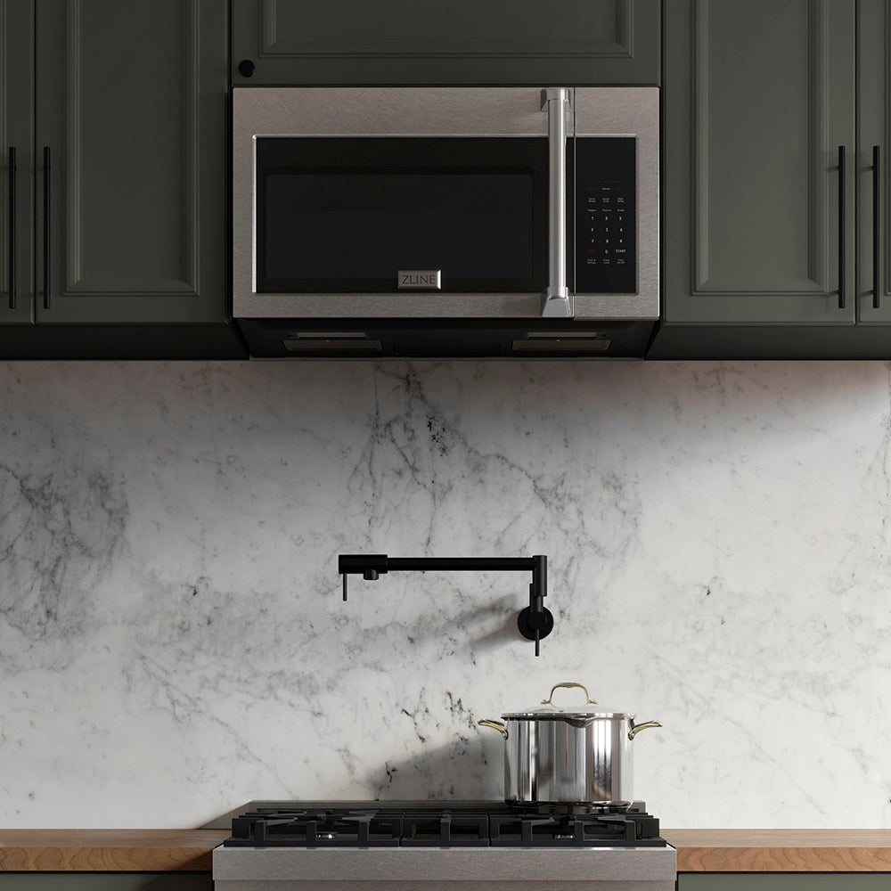 ZLINE 30 in. 1.5 cu. ft. Over-The-Range Convection Microwave Oven in Satin Stainless Steel with Traditional Handle and Sensor Cooking (MWO-OTR-H-30-SS) in a kitchen with stainless steel range, marble backsplash, and pot on cooktop.