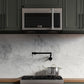 ZLINE 30 in. 1.5 cu. ft. Over-The-Range Microwave in Satin Stainless Steel with Traditional Handle and Set of 2 Charcoal Filters (MWO-OTRCFH-30-SS) in a kitchen with marble backsplash and pot on cooktop.
