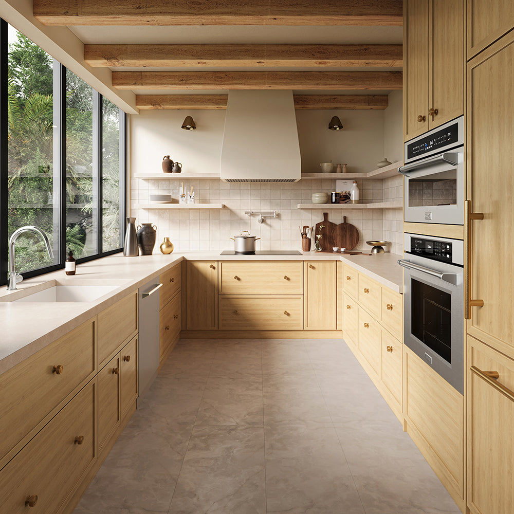 ZLINE 36 in. Induction Cooktop with Anti-Scratch Glass and 5 Elements (FCIND-36) in a modern kitchen interior with light wood cabinetry, beige stone countertops and floor, open shelving, a white range hood, and built-in stainless steel appliances.