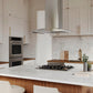 ZLINE 30 in. Gas Cooktop with 4 Brass Burners and Black Porcelain Top (RC-BR-30-PBT) in a kitchen with marble countertops, stainless steel appliances, and wooden cabinets.