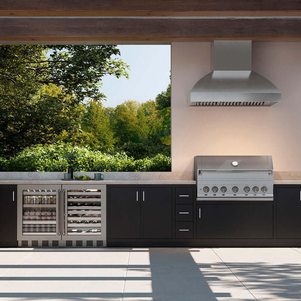 Outdoor patio with hood above grill