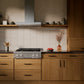ZLINE 30 in. Classic Gas Rangetop with 4 Burner DuoPro™ Cooktop in Stainless Steel (PCRT30) in a kitchen with wooden cabinets and a dark countertop, front.