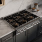 ZLINE 36 in. Classic Gas Rangetop with 6 Burner DuoPro™ Cooktop in Stainless Steel (PCRT36) in a kitchen with marble countertops from above.