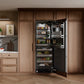 ZLINE 30 in. 16.7 cu. ft. Panel Ready Column Refrigerator with Graphite Gray Interior (RBCRV-30) in a modern kitchen with the unit open, displaying various food items.