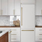 ZLINE Autograph Edition 30 in. 16.1 cu. ft. Built-In Bottom Freezer Refrigerator with Water Dispenser and Ice Maker in White Matte with Graphite Gray Interior and Champagne Bronze Accents (GRBIVZ-WM-30-CB) lifestyle, in a luxury kitchen.