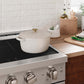 White pot on a ZLINE 30 in. 4.2 cu. ft. Paramount Induction Range with 4 Element Cooktop and Electric Convection Oven in Stainless Steel (SINR30) in a kitchen setting