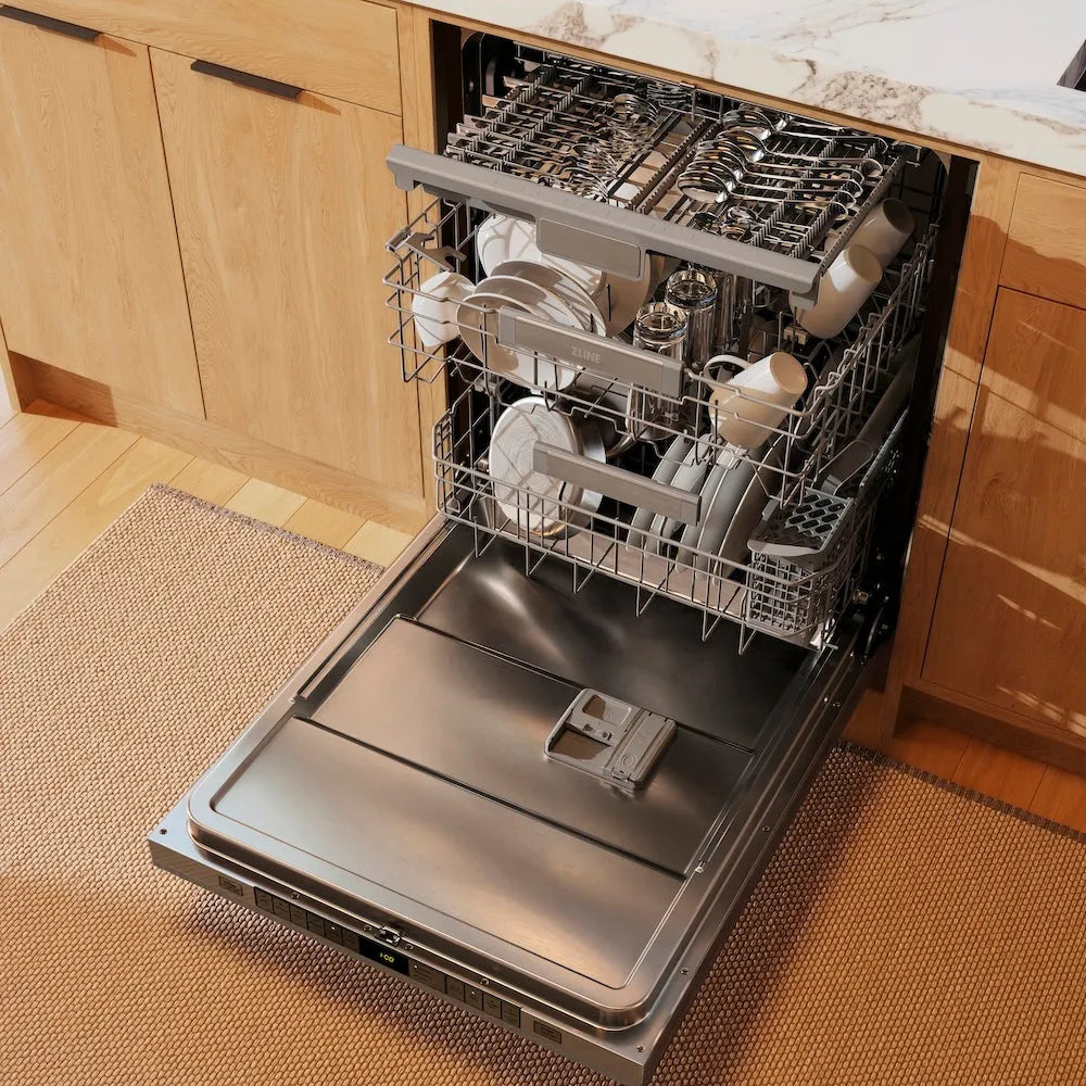 Open ZLINE 24 in. Monument Series 3rd Rack Dishwasher with Auto Door Open Drying, 44dBa, Satin Stainless Steel Panel (DWMT-SN-24) with clean dishes in a kitchen setting