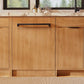ZLINE Autograph Edition 24 in. Monument Series 3rd Rack Dishwasher with Auto Door Open Drying, 44dBa, Panel Ready with Matte Black Handle (DWMTZ-24-MB) in a kitchen with wooden cabinets and a window view.