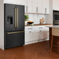 Modern kitchen with a ZLINE Autograph Edition 36 in. 28.9 cu. ft. Standard-Depth French Door External Water Dispenser Refrigerator with Dual Ice Maker in Fingerprint-Resistant Black Stainless Steel and Champagne Bronze Traditional Handles (RSMZ-W-36-BS-CB)
