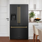 ZLINE Autograph Edition 36 in. 28.9 cu. ft. Standard-Depth French Door External Water Dispenser Refrigerator with Dual Ice Maker in Fingerprint-Resistant Black Stainless Steel and Champagne Bronze Traditional Handles (RSMZ-W-36-BS-CB) in a kitchen setting
