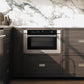 ZLINE 24 in. 1.2 cu. ft. Built-in Microwave Drawer with a Traditional Handle in Stainless Steel (MWD-1-H) embedded in wooden kitchen cabinetry with marble backsplash