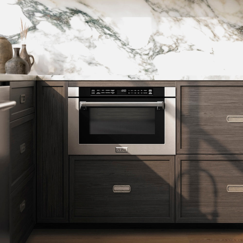 ZLINE 24 in. 1.2 cu. ft. Built-in Microwave Drawer with a Traditional Handle in Stainless Steel (MWD-1-H) embedded in wooden kitchen cabinetry with marble backsplash