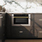 Modern kitchen with a ZLINE Autograph Edition 24 in. 1.2 cu. ft. Built-in Microwave Drawer with a Traditional Handle in Stainless Steel and Champagne Bronze Accents (MWDZ-1-H-CB) and marble countertop