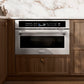 ZLINE 30 in. 1.6 cu. ft. Built-in Convection Microwave Oven in Stainless Steel with Speed and Sensor Cooking (MWO-30) in a kitchen setting with wooden cabinets and marble backsplash.
