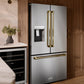 Designer kitchen with a ZLINE Autograph Edition 36 in. 28.9 cu. ft. Standard-Depth French Door External Water Dispenser Refrigerator with Dual Ice Maker in Fingerprint-Resistant Stainless Steel and Polished Gold Traditional Handles (RSMZ-W-36-G) and wine cooler.