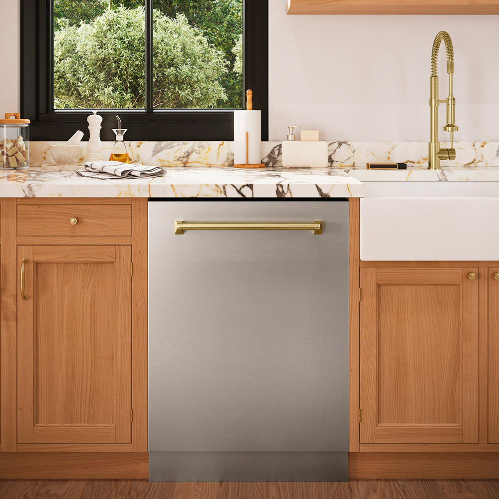 ZLINE Autograph Edition 24 in. Monument Series 3rd Rack Top Touch Control Tall Tub Dishwasher in Stainless Steel with Champagne Bronze Handle, 45dBa (DWMTZ-304-24-CB) in a luxury kitchen with wooden cabinets and marble countertops.