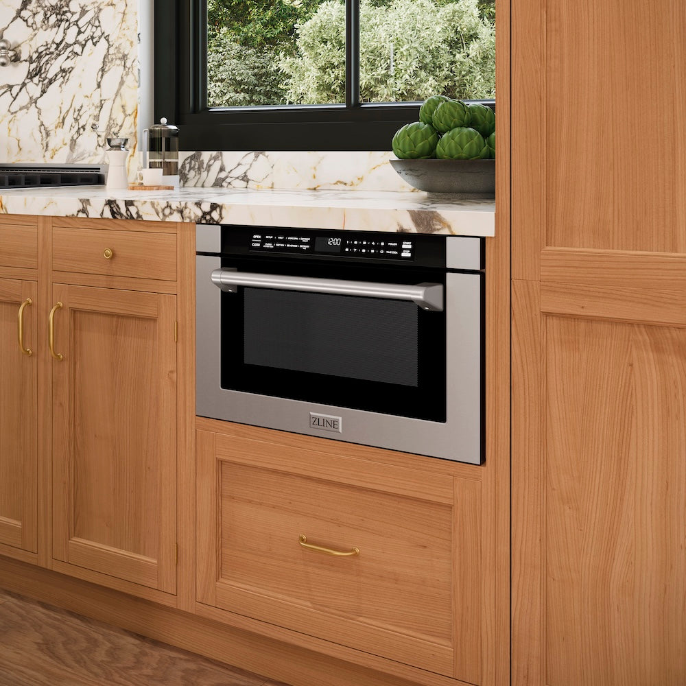 ZLINE 24 in. 1.2 cu. ft. Built-in Microwave Drawer with a Traditional Handle in Stainless Steel (MWD-1-H) embedded in wooden kitchen cabinetry with marble countertop.