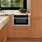 Modern kitchen with wooden cabinets, marble countertop, and ZLINE 24 in. 1.2 cu. ft. Built-in Microwave Drawer with a Traditional Handle in Stainless Steel (MWD-1-H).