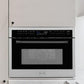 ZLINE Autograph Edition 24 in. 1.6 cu ft. Built-in Convection Microwave Oven in Stainless Steel with Matte Black Accents (MWOZ-24-MB) in a kitchen wall