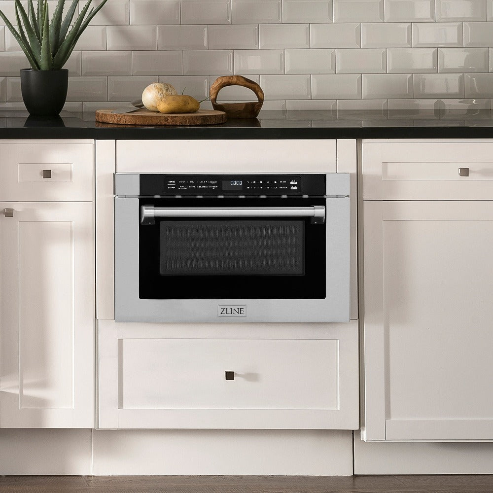 ZLINE 24 in. 1.2 cu. ft. Built-in Microwave Drawer in Stainless Steel with a Traditional Handle (MWD-1-H) in white cabinets with black countertops.