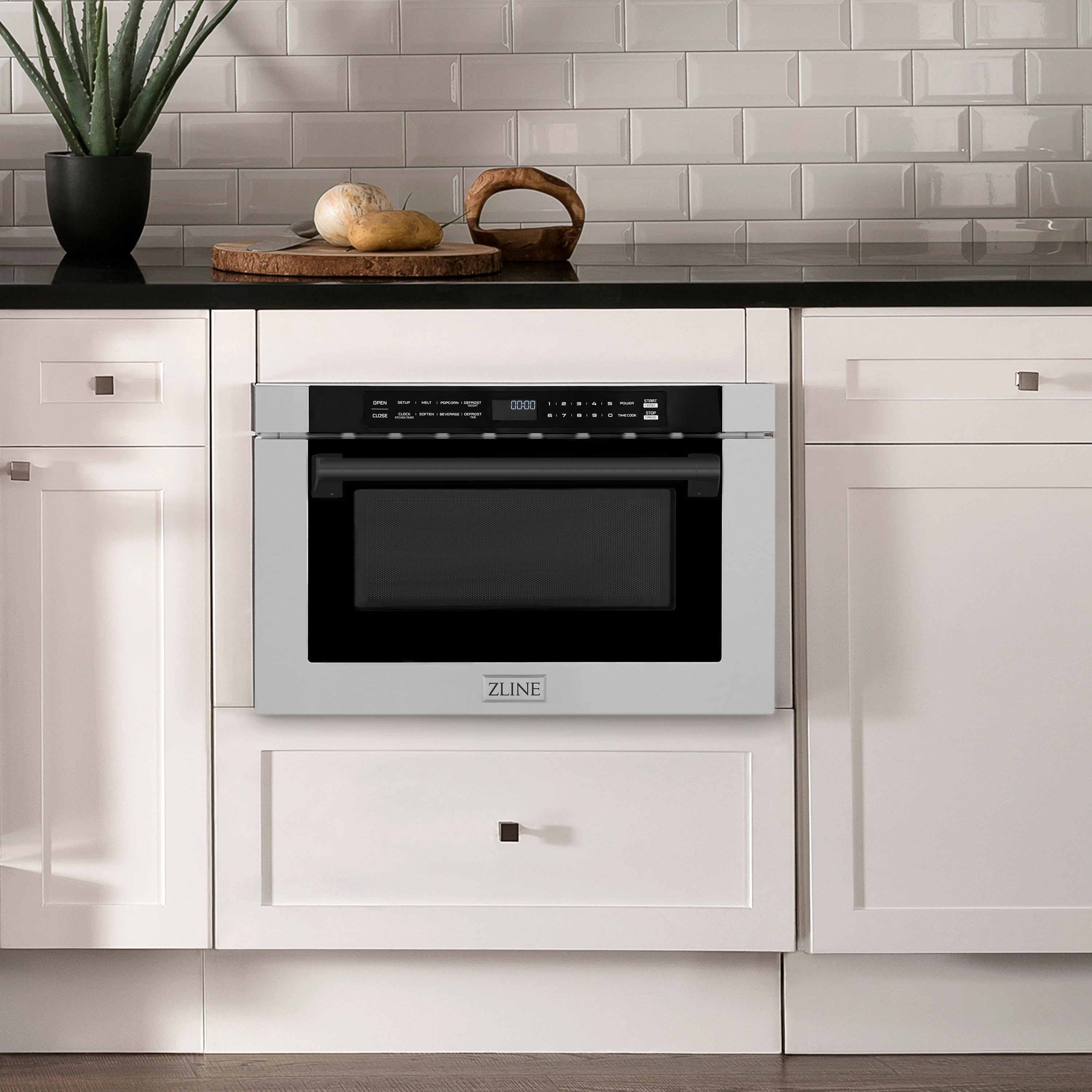 ZLINE Autograph Edition 24 in. 1.2 cu. ft. Built-in Microwave Drawer with a Traditional Handle in Stainless Steel and Matte Black Accents (MWDZ-1-H-MB) in Rustic Farmhouse Style Kitchen with white cabinets and black countertops.