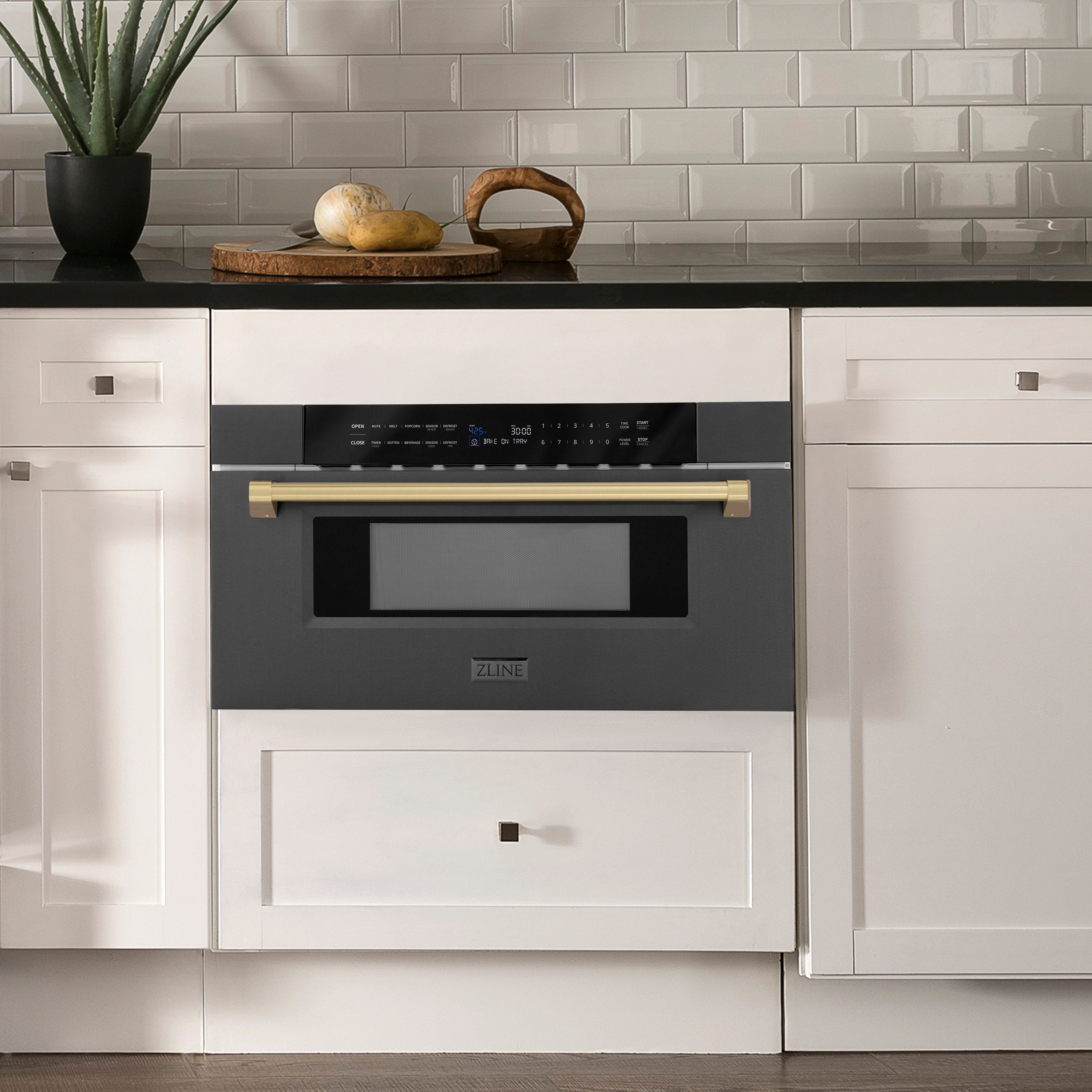 ZLINE Autograph Edition 30 in. 1.2 cu. ft. Built-in Microwave Drawer in Black Stainless Steel with Champagne Bronze Accents (MWDZ-30-BS-CB) in Rustic Farmhouse Style Kitchen with white cabinets and black countertops.