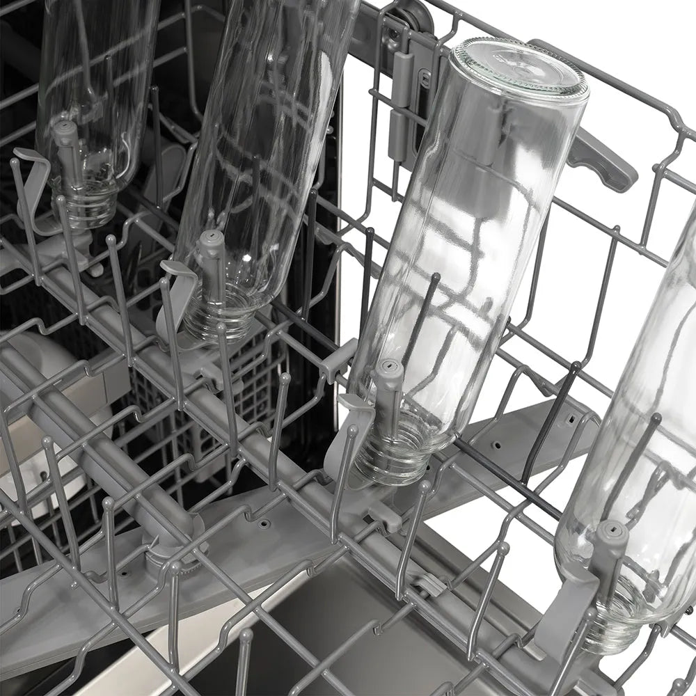 ZLINE Autograph Edition 24 in. Monument Series 3rd Rack Dishwasher with Auto Door Open Drying, 44dBa, White Matte Panel with Champagne Bronze Handle (DWMTZ-WM-24-CB), close-up, open rack with glass bottles on bottle jets.
