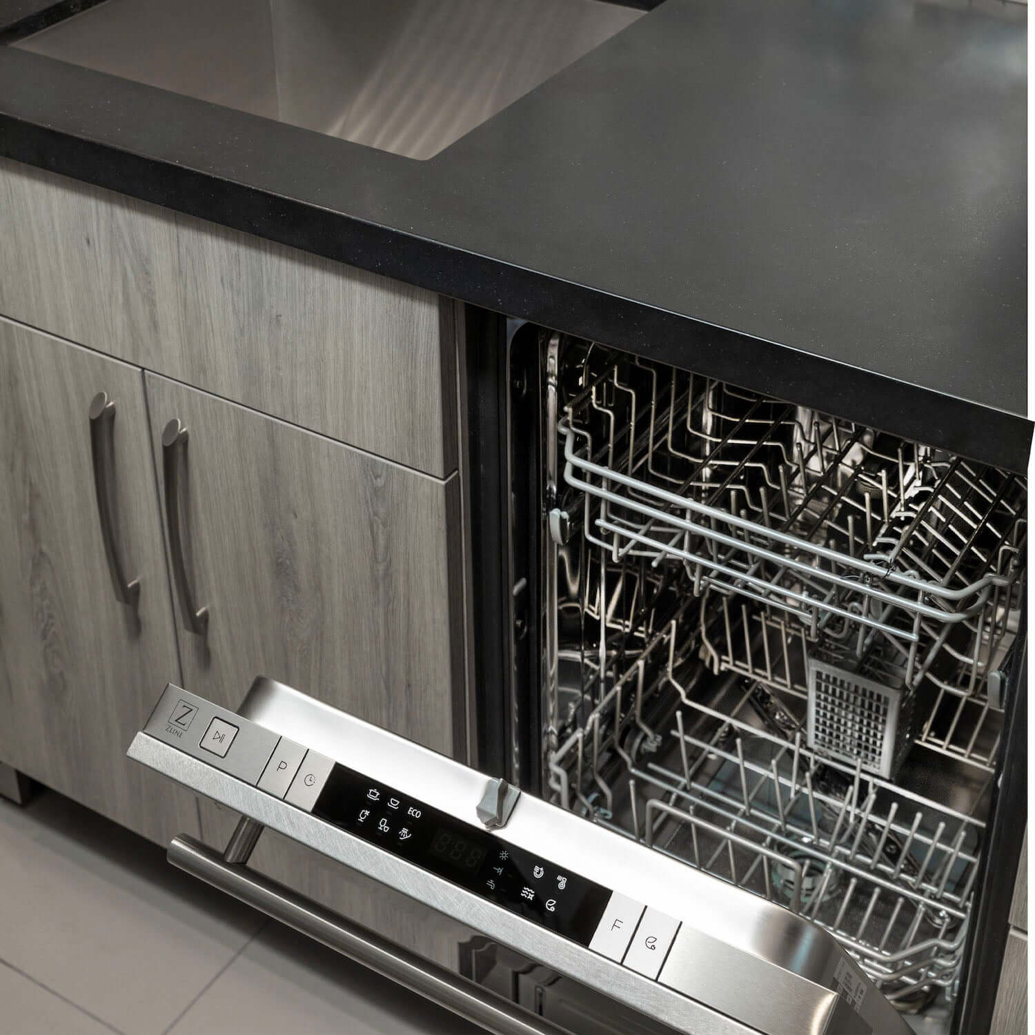 ZLINE 24 in. Fingerprint Resistant Top Control Built-In Dishwasher with Stainless Steel Tub and Modern Style Handle, 52dBa (DW-SN-24) built-in to cabinets in a luxury kitchen.