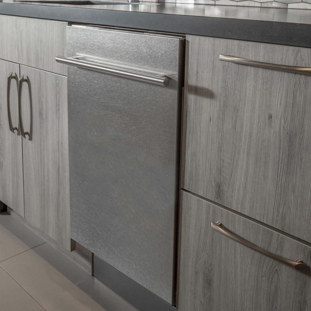 ZLINE 24 in. Top Control Built-In Dishwasher with Satin Stainless Steel Panel and Stainless Steel Tub with Modern Style Handle, 52dBa (DW-SN-24) built-in to cabinets in a luxury kitchen.
