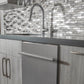 ZLINE 24 in. Stainless Steel Top Control Built-In Dishwasher with Stainless Steel Tub and Modern Style Handle, 52dBa (DW-304-24) built-in to cabinets in a luxury kitchen.
