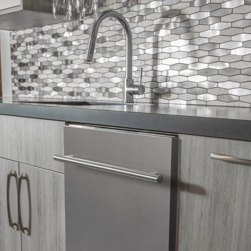 ZLINE 24 in. Stainless Steel Top Control Built-In Dishwasher with Stainless Steel Tub and Modern Style Handle, 52dBa (DW-304-24) built-in to cabinets in a luxury kitchen.