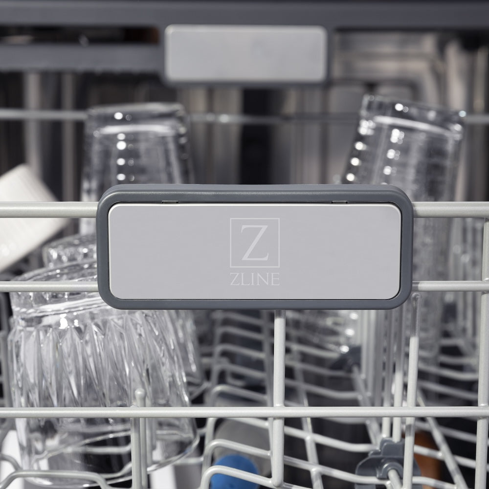 ZLINE 24 in. Monument Series 3rd Rack Top Touch Control Dishwasher with Stainless Steel Panel, 45dBa (DWMT-304-24) close-up, ZLINE logo on dish rack.