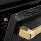 ZLINE Autograph Edition 36 in. 5.2 cu. ft. Paramount Induction Range with 5 Element Cooktop and Electric Convection Oven in Black Stainless Steel with Polished Gold Helix Handle and Knob Accents (SINRBZ-36-KG) oven door slightly open showing handle detail.