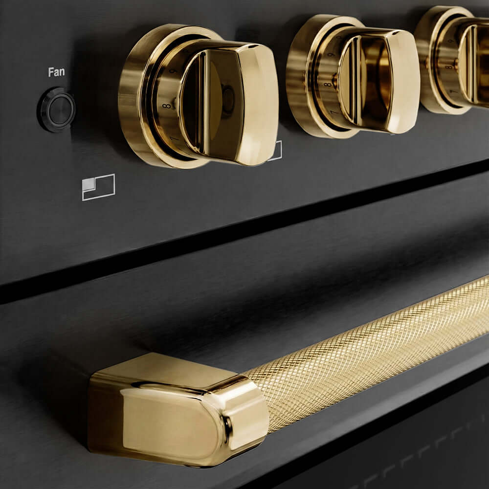 ZLINE Autograph Edition 36 in. 5.2 cu. ft. Paramount Induction Range with 5 Element Cooktop and Electric Convection Oven in Black Stainless Steel with Polished Gold Helix Handle and Knob Accents (SINRBZ-36-KG) close-up of oven and cooktop knob controls.