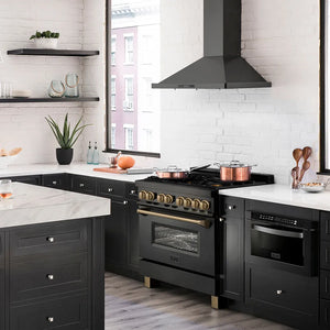 ZLINE Autograph Edition 36 in. 4.6 cu. ft. Legacy Dual Fuel Range with 6 Burner Gas Cooktop and Electric Convection Oven in Black Stainless Steel and Champagne Bronze Accents (RABZ-36-CB) in a kitchen with black appliances and white countertops