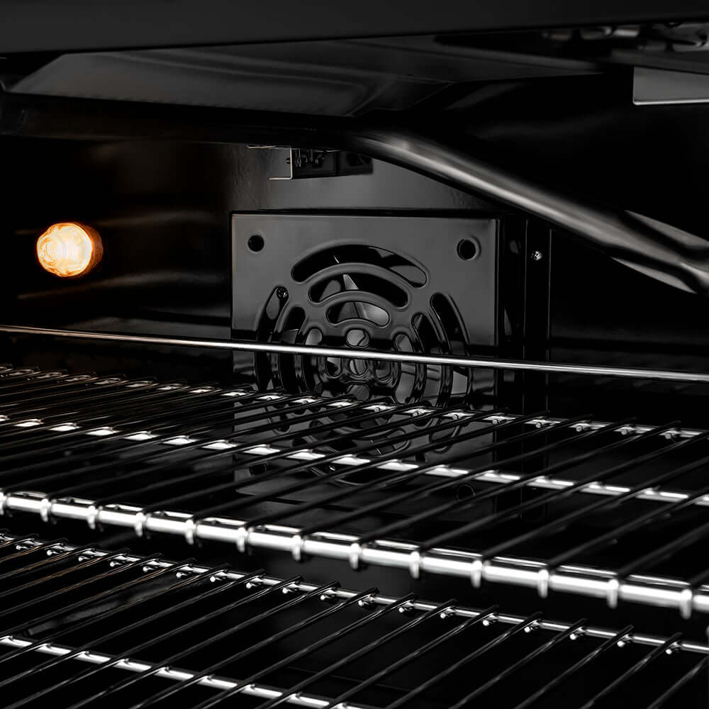 ZLINE 30 in. 4.2 cu. ft. Paramount Gas Range with 4 Burner Cooktop and Convection Gas Oven in Black Satin Stainless Steel (SGRBS-30) convection fan and lighting inside oven.