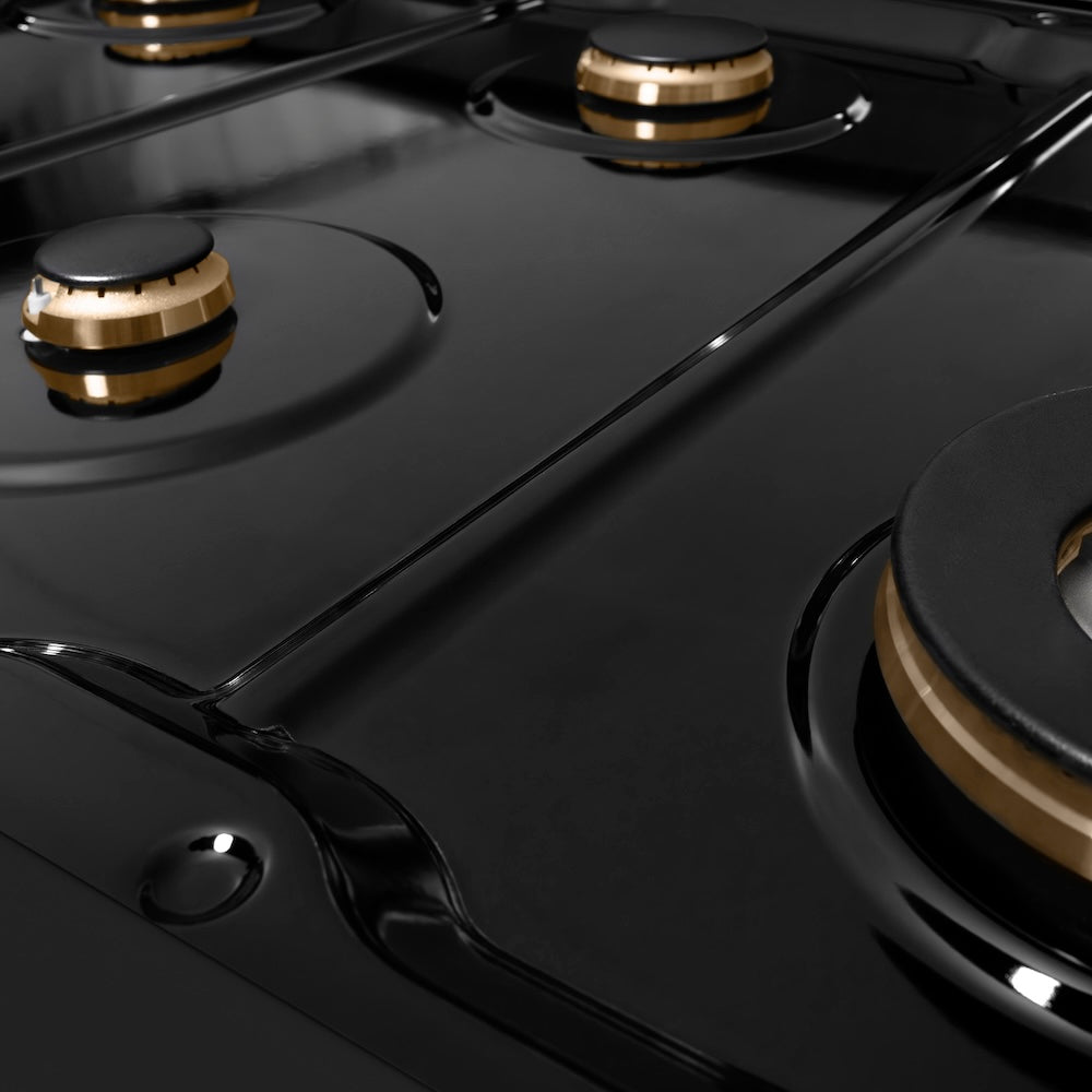 ZLINE Autograph Edition 48 in. 6.7 cu. ft. Paramount Double Oven Dual Fuel Range with 8 Burner Gas Cooktop in Black Stainless Steel and Champagne Bronze Helix Handles and Knob Accents (SDRBZ-48-KCB) black porcelain cooktop and brass burners with no grates.