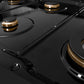 ZLINE Autograph Edition 48 in. 6.7 cu. ft. Paramount Double Oven Gas Range with 8 Burner Cooktop in Black Stainless Steel and Champagne Bronze Helix Handles and Knob Accents (SGRBZ-48-KCB) black porcelain cooktop and brass burners with no grates.