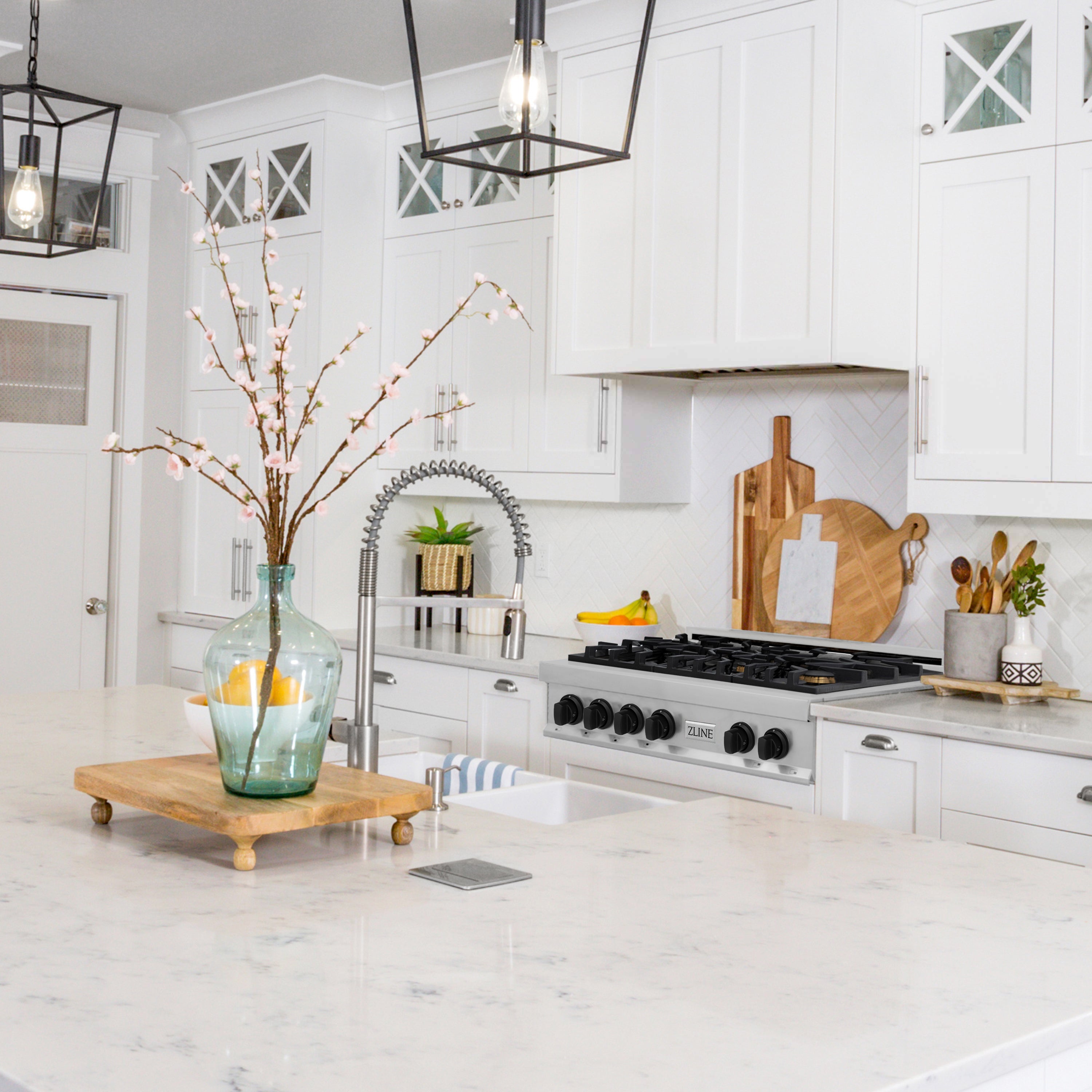 ZLINE Autograph Edition 36 in. Rangetop in Stainless Steel in a cottage-style kitchen with white cabinetry.