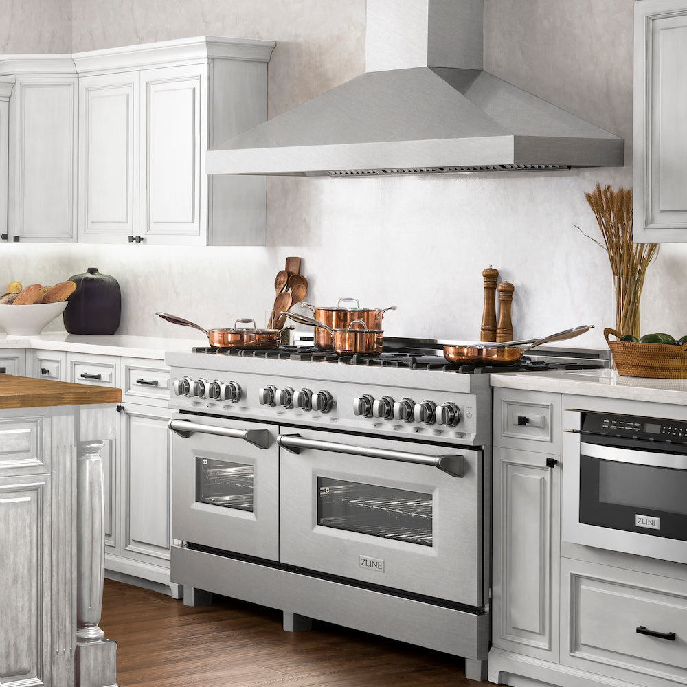 ZLINE 60 in. 7.4 cu. ft. Dual Fuel Range with Gas Stove and Electric Oven in Fingerprint Resistant Stainless Steel (RAS-SN-60) from side in a luxury farmhouse-style kitchen.