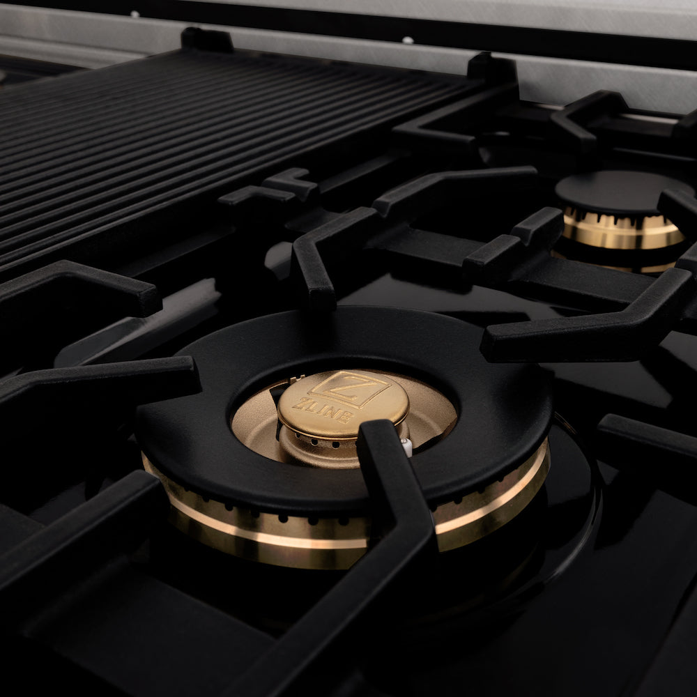 ZLINE 60 in 7.4 cu. ft. Dual Fuel Range with Gas Stove and Electric Oven in Fingerprint Resistant Stainless Steel with Brass Burners (RAS-SN-BR-60) close-up, brass burners and griddle on cast-iron grates.